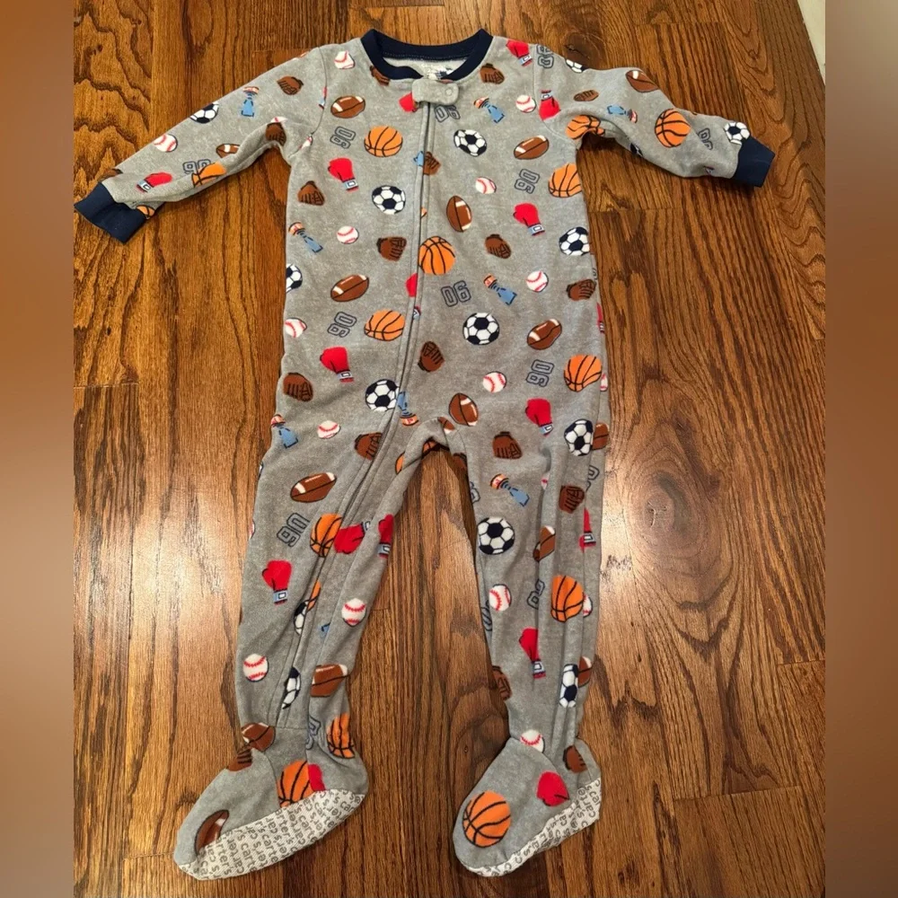 Pair of Carter's fleece PJs with zipper and footies.  Size 24 Months
